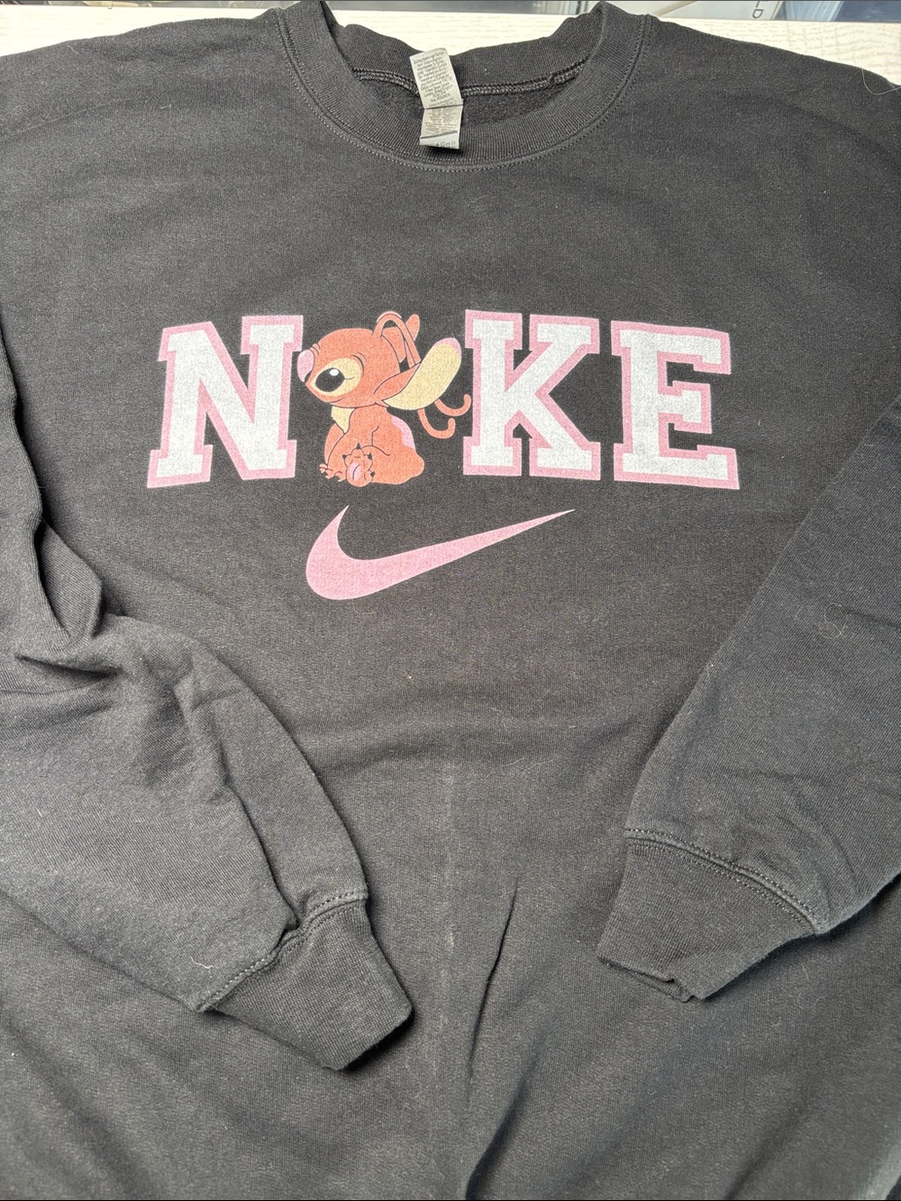 Black Crewneck Sweatshirt with Pink Graphic